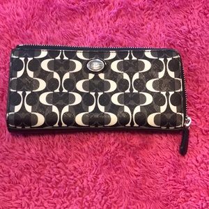 Coach Signature “C” Zippered Wallet